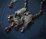Load image into Gallery viewer, Gold Bronze Phoenix Necklace with Gemstones - Phoenix Rising Pendant - Firebird Necklace - Phoenix Bird Jewelry - Garnet &amp; Sunstone
