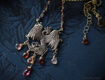 Load image into Gallery viewer, Gold Bronze Phoenix Necklace with Gemstones - Phoenix Rising Pendant - Firebird Necklace - Phoenix Bird Jewelry - Garnet &amp; Sunstone
